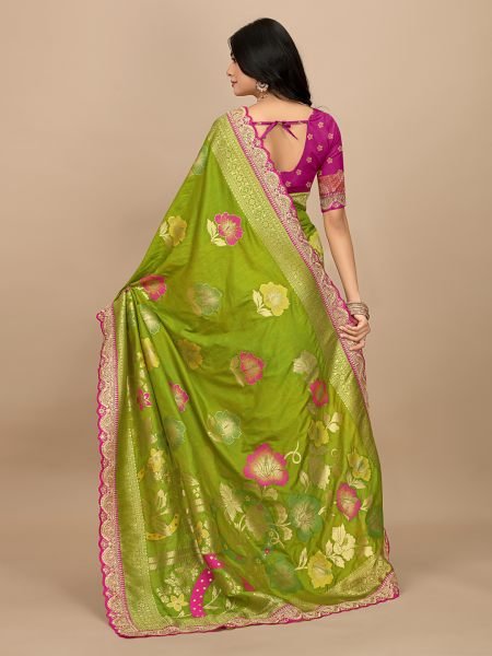 Green Dola Silk Kanjivaram Saree with Jacquard Work and Embroidered Lace Border Kanjivaram Sarees